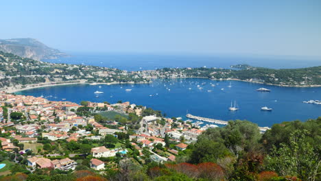 villefranche-sur-mer and azure blue bay, france, high angle right pan