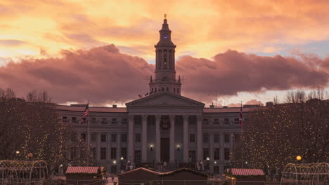 day to night time lapse of the denver courthouse with christmas lights turning on as it gets dark