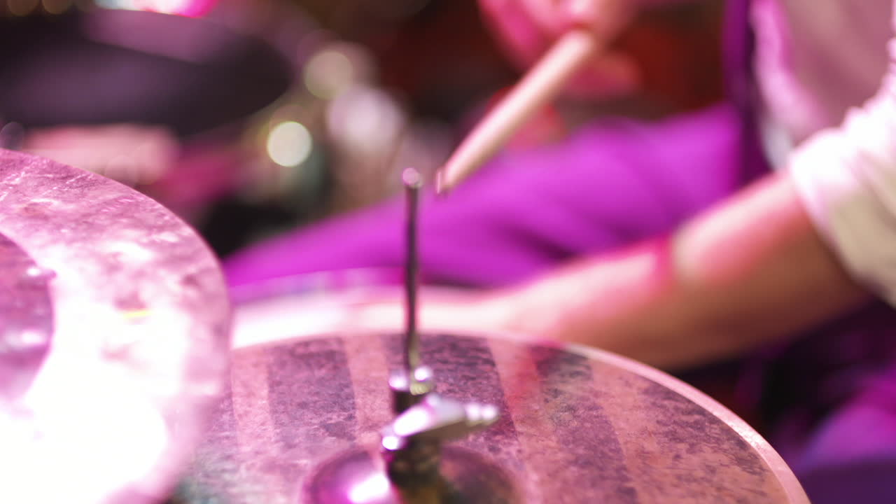 Close Up of Drummer Playing Cymbals with Drumsticks