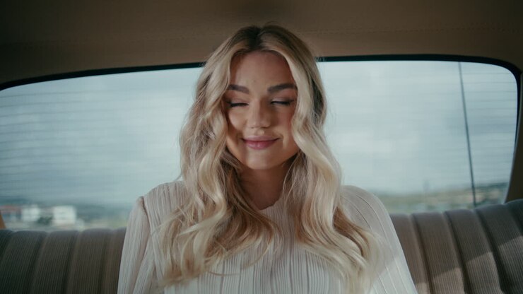 Woman in a Vintage Car Backseat