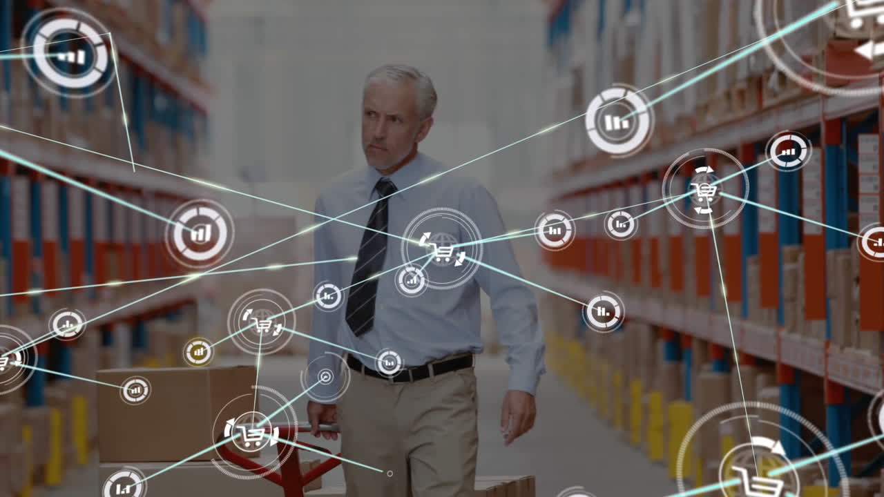 red de iconos digitales contra el supervisor superior caucásico tirando de una paleta en el almacén