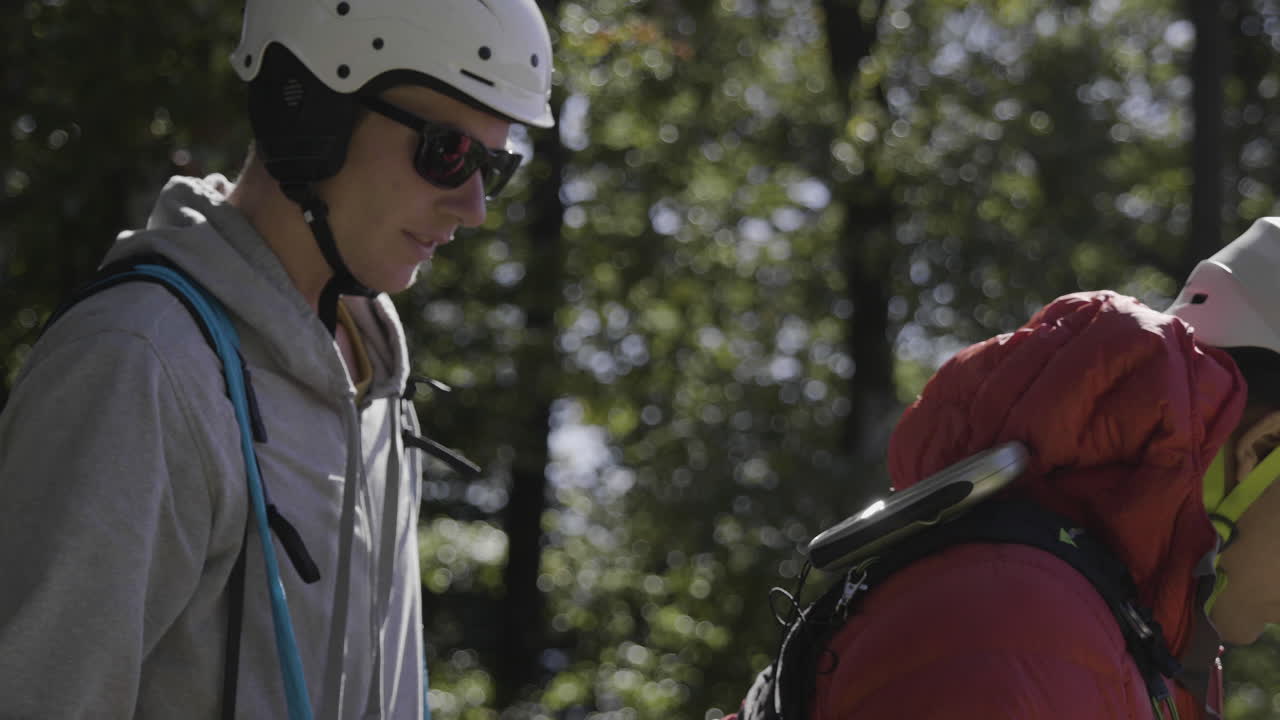 Friends collaborating on outdoor activity