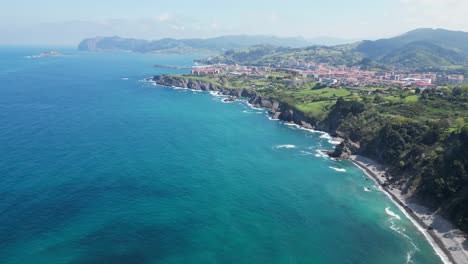 green coast in bermeo, bay of biscay, basque country, north spain - aerial 4k