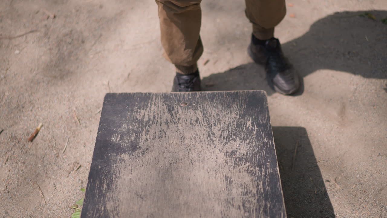 Disciplinedriven Calisthenics Under Urban Sky, White Athlete Demonstrates Intense Incline Pushups Outdoors, Urban Park Scene With Focused Athlete Performing Rigorous Incline Pushups On Bench