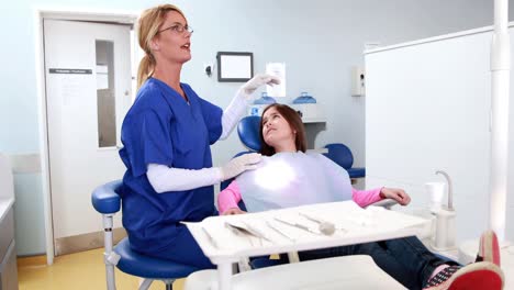 Dentist-comforting-an-afraid-child