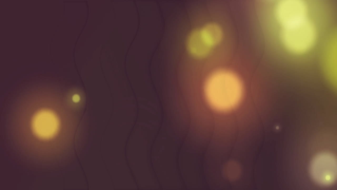 Animation of light spots over dark shapes moving