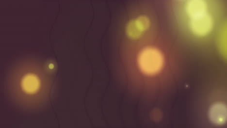 Animation of light spots over dark shapes moving