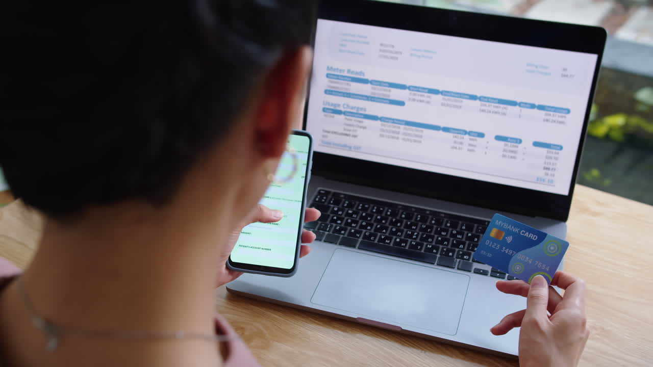 Woman Filling Online Form with Credit Card