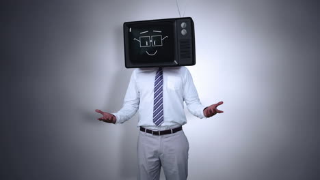un hombre de negocios con una televisión en la cabeza.
