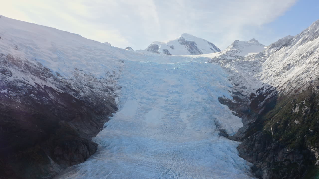 Glacier Alley Plunges To The Edge Of The Beagle Channel In South America. Tilt-up Shot