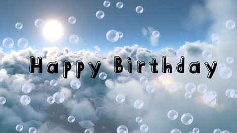 Animation-of-happy-birthday-text-and-soap-bubbles-over-cloudy-sky