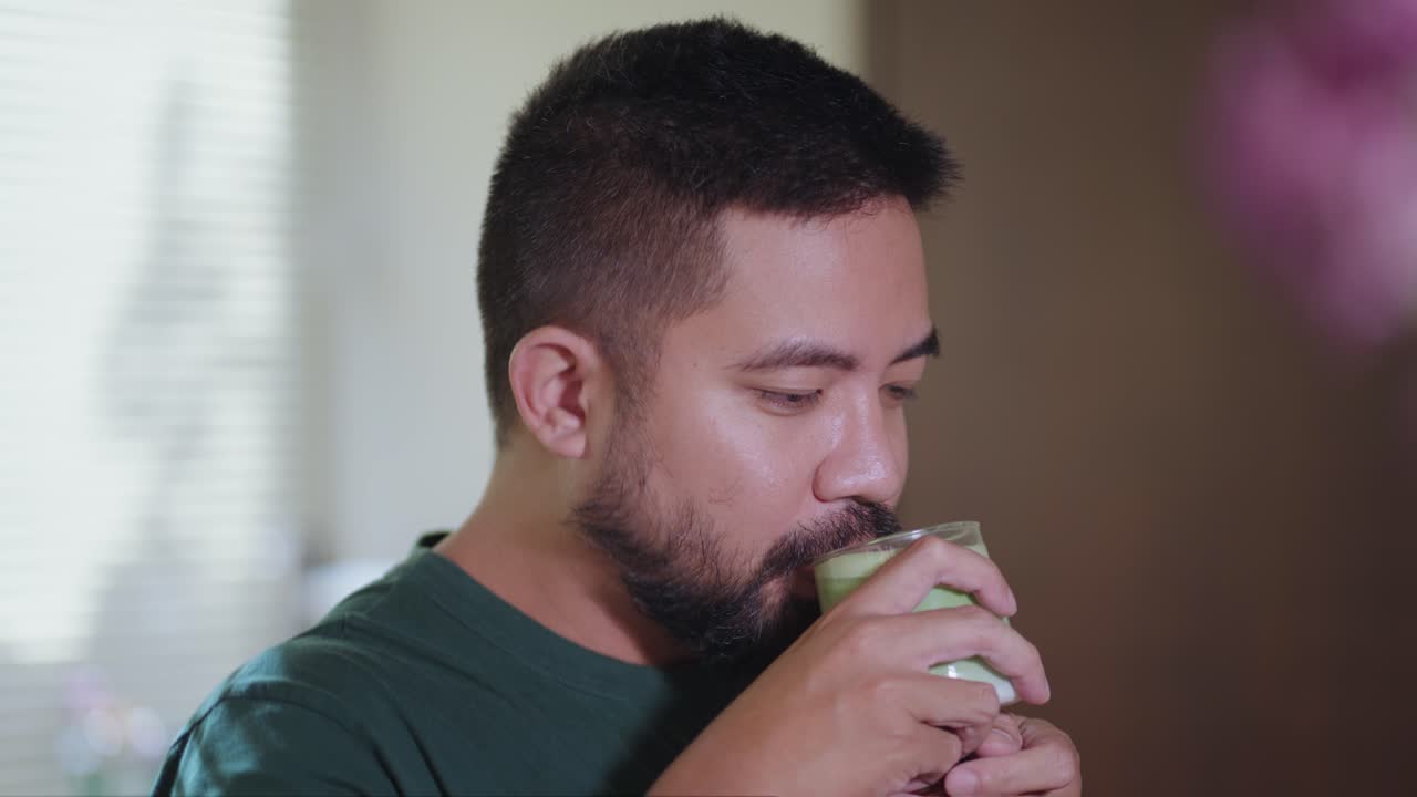 Man Drinking Green Tea
