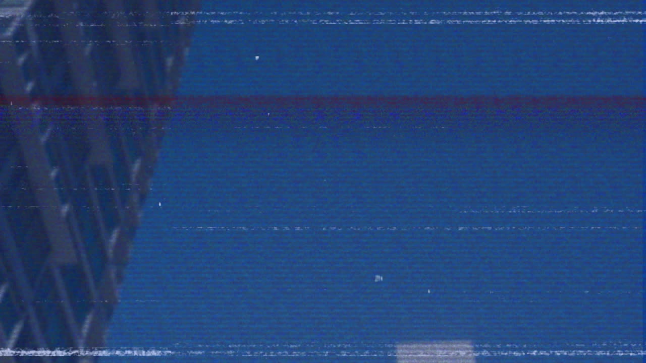 Animation of screen with glitch over tower block on blue background