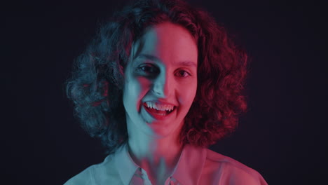 neon portrait of a happy young woman