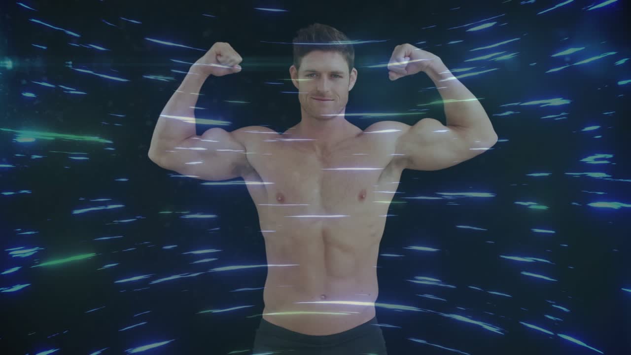 Fitness model holding double-arm pose, rotating on cue while light streaks sweeping, showing detail
