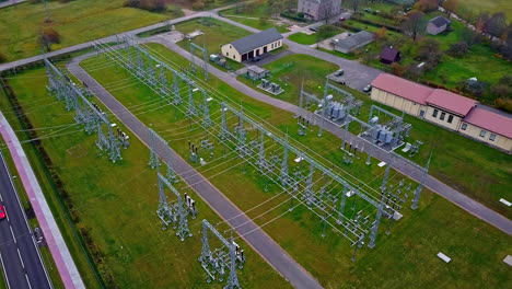 drone aerial view of a electric power plant in a green environment in northern europe