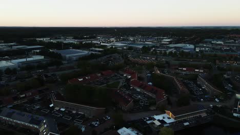 aerial of a beautiful suburban neighborhood at sunset