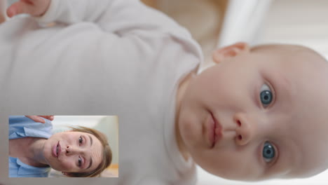 cute baby video chatting with mother on smartphone mom greeting toddler enjoying communicating with child on video chat at home vertical orientation