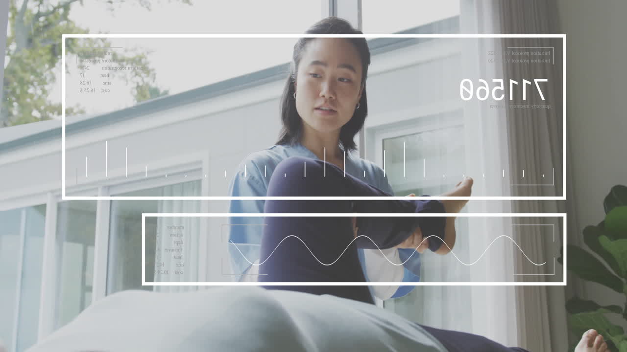 Stretching leg, Asian woman with digital animation overlay in bright room