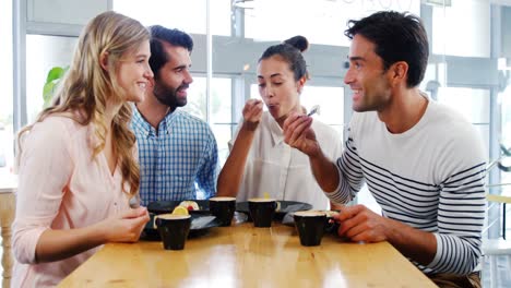 Friends-having-breakfast-in-restaurant