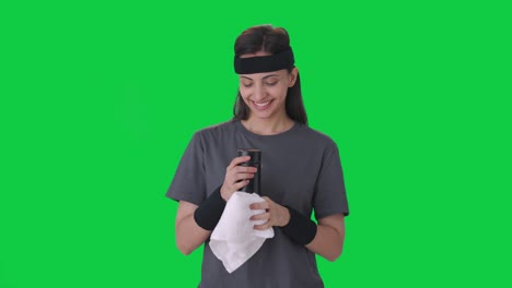 Happy-Indian-woman-wiping-sweat-and-drinking-water-Green-Screen