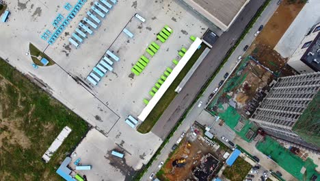 Bus-station-in-Nanhai-New-District,-China,-aerial-bird's-eye-view