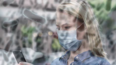 animation of covid 19 cells moving over woman in face mask