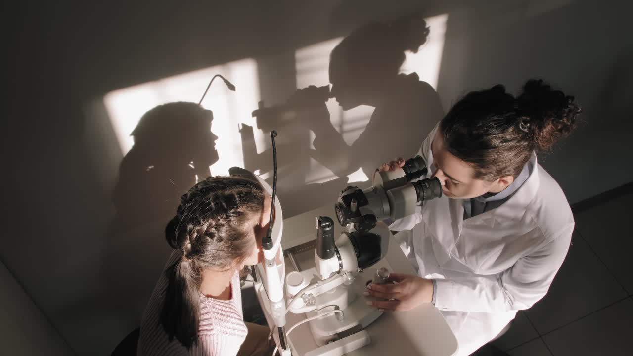 Top-View Of Eye Checkup At Oculist Office