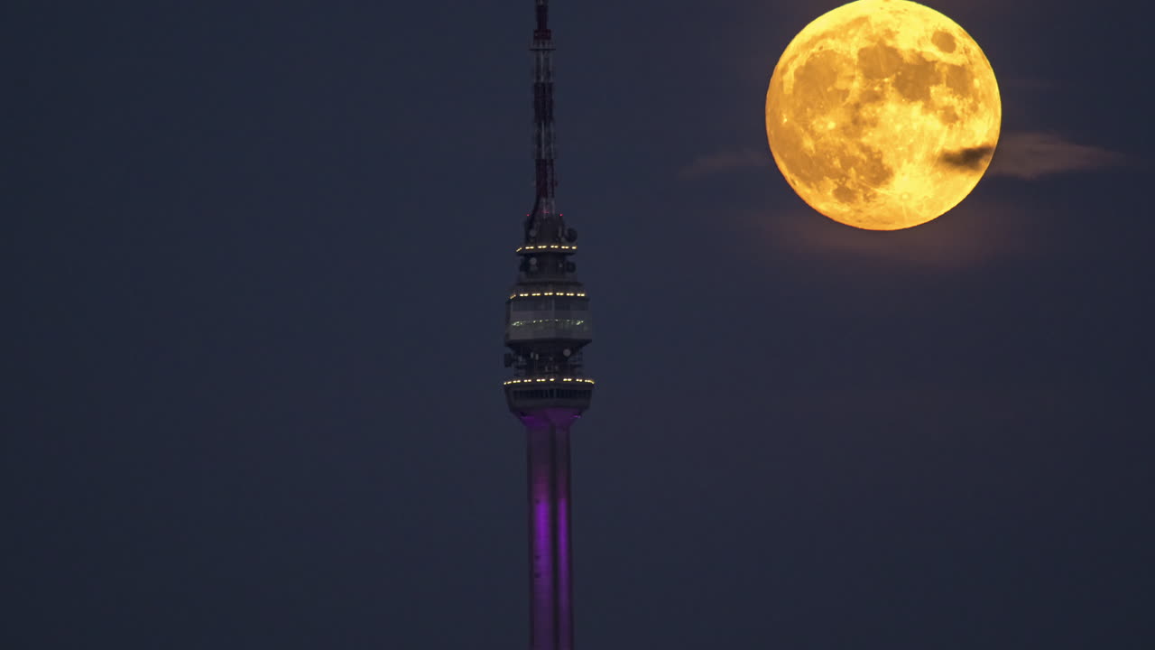 Full Moon and Telecommunications Tower