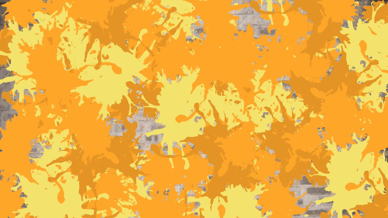 Animazione di diverse macchie colorate su un muro di mattoni