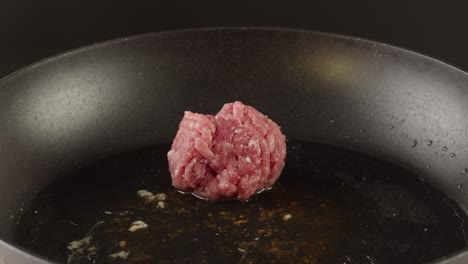 cooking minced meat in a pan