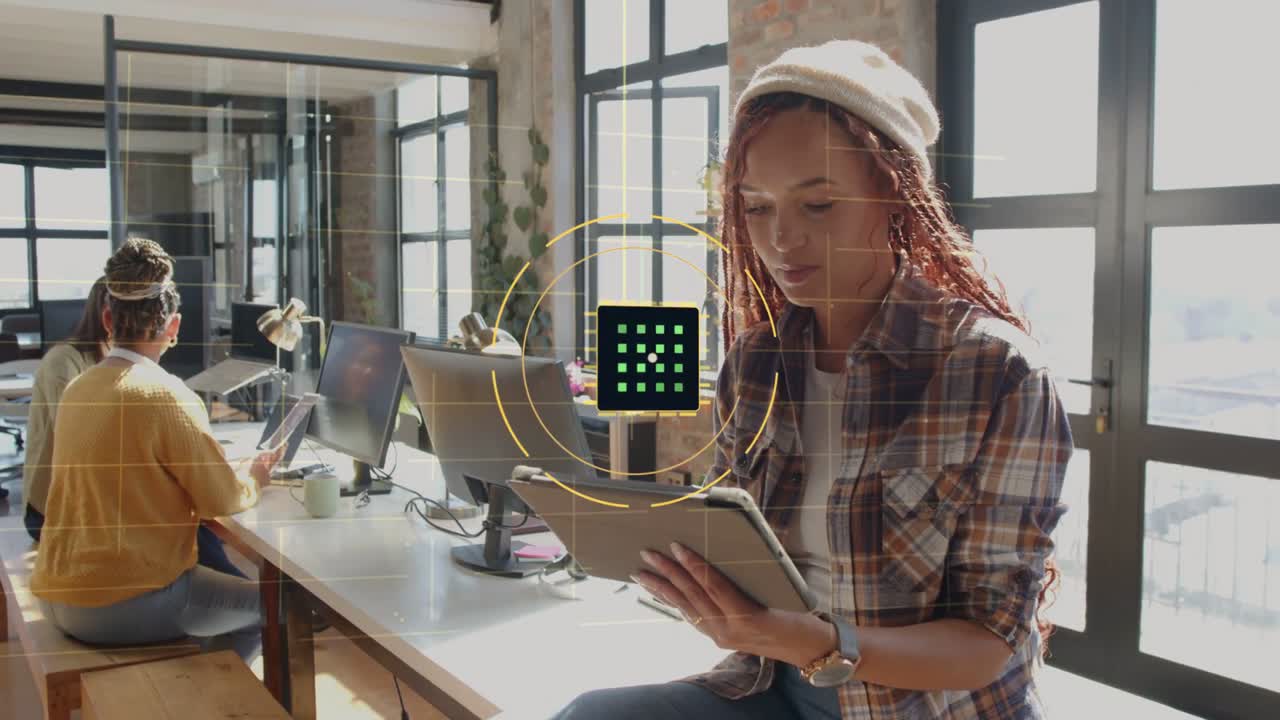 Right woman tapping tablet in office, creating green grid with arcs showing QUANTUM for tech demo