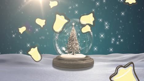 animation of falling christmas bells over snow globe with christmas tree in winter scenery