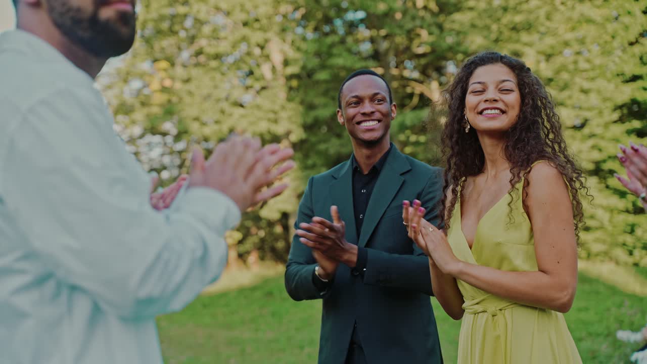 Group of people celebrating outdoors