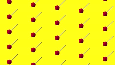 lollipop pattern animation on yellow background. candy on stick, food rotation.