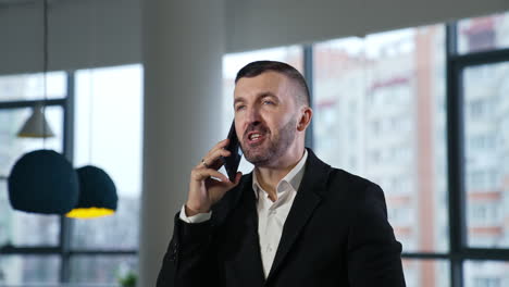 business talk on the mobile phone. business call to the partners or clients. businessman having a conversation on his smartphone.