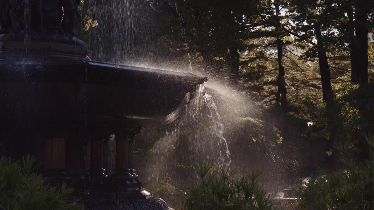 Water Flow Splash at Bethesda Terrace Fountain Central Park New York City Manhattan in Sunny Morning, Urban Architectural Monument Art and Water Flowing