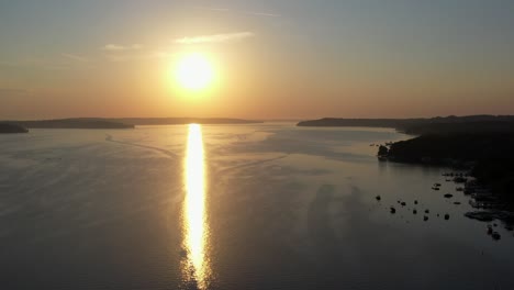 aerial view of the sun setting over lake geneva, wisconsin