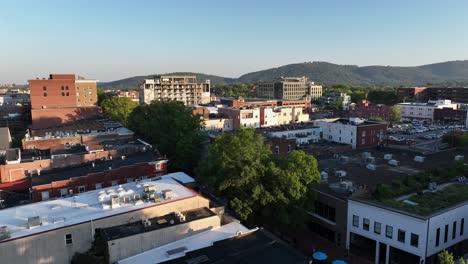 aerial view of a cityscape with mountains in the background