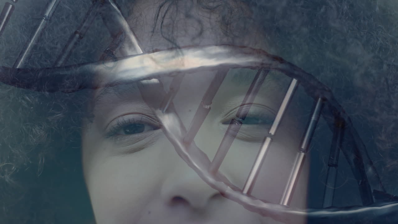 Animating DNA strand over close-up of person face, showing genetic connection
