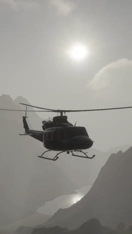 helicopter flying over mountains