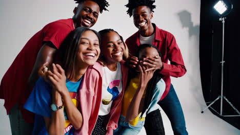 happy friends in a studio portrait