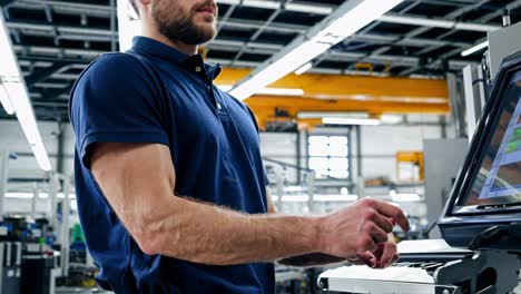 skilled technician manages modern equipment in a high tech manufacturing facility, demonstrating precision and expertise in industrial operations