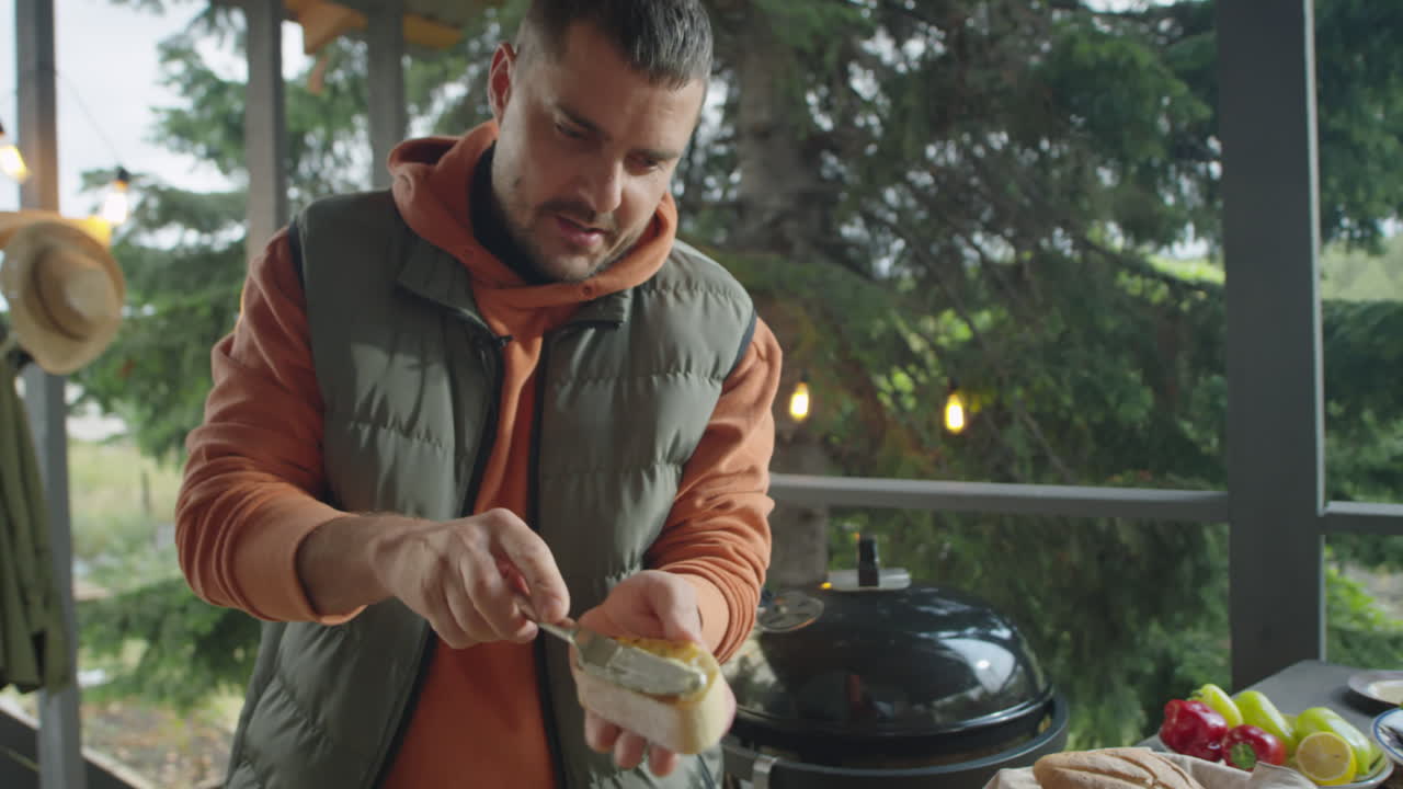 Food Blogger Cooking Bruschettas on Outdoor Terrace