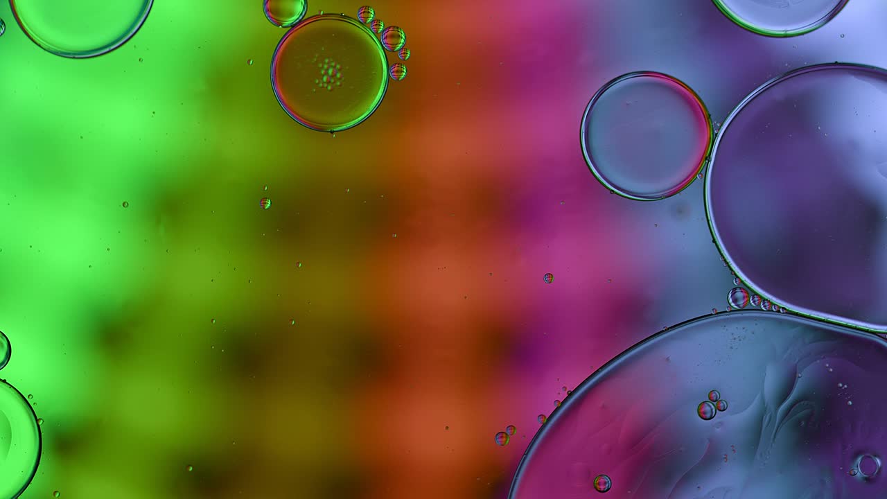 Abstract Colorful Food Oil Drops Bubbles and spheres Flowing