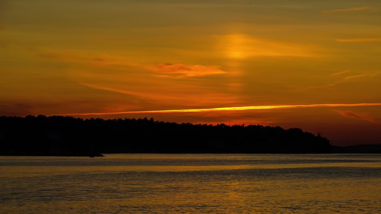 Timelapse of the sun setting over the bay in Västervik, Sweden in July