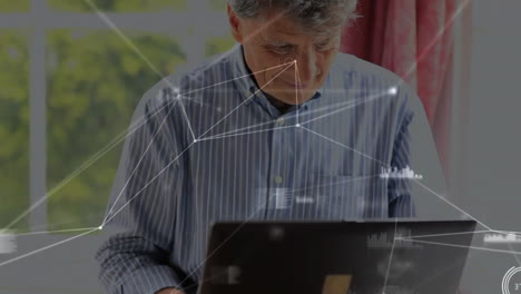 Animation of network of connections over caucasian man using laptop