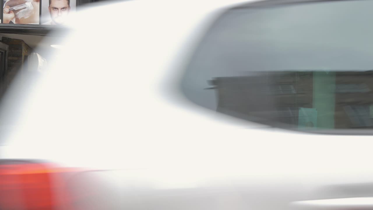 First day of rules relaxing, barber opens for business in small british town