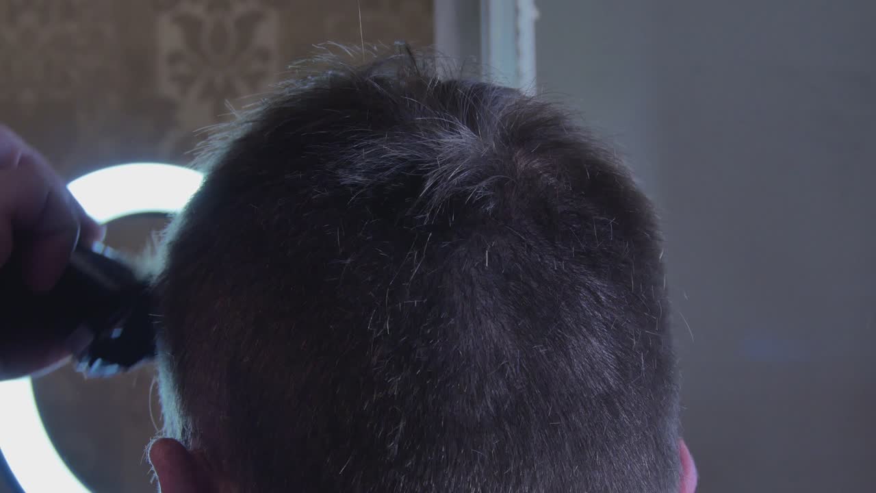Electric Machine Cut Hair Fall. 4K Footage