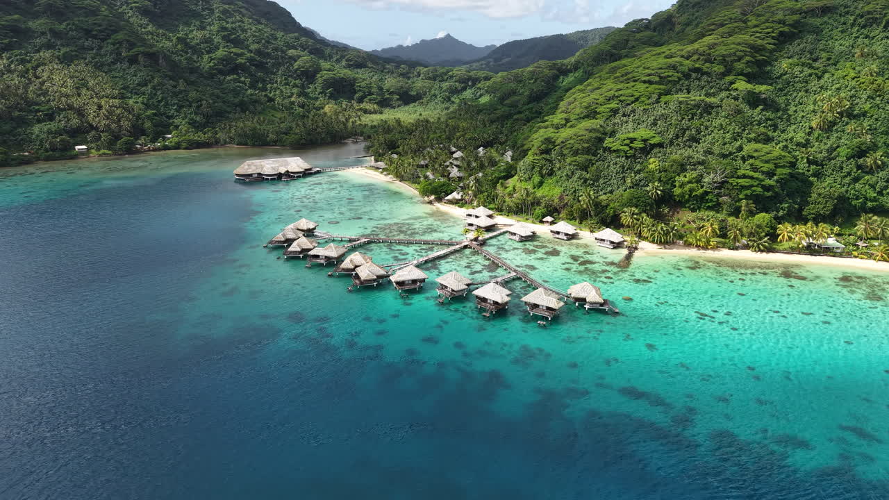 Huahine Island, French Polynesia. Aerial View of Luxury Resort With Overwater Villas in Turquoise Lagoon Water